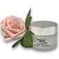 Crema facial hidratante para piel madura Cosméticos 1900 con flor decorativa
